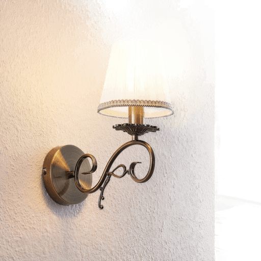 Lindby vegglampe Finnick, antikk messing, 34 cm