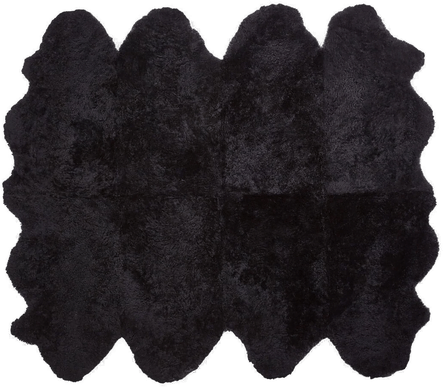 Natures Collection Saueskinnteppe 180x214 cm - Svart