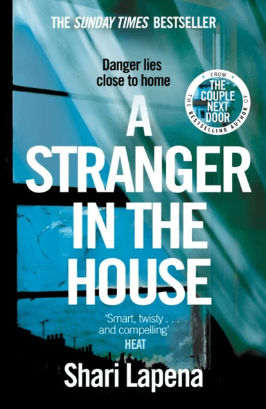 A Stranger in the House av Shari Lapeña