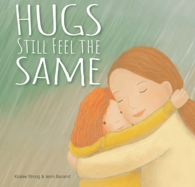 Hugs Still Feel the Same av Kiralee Strong